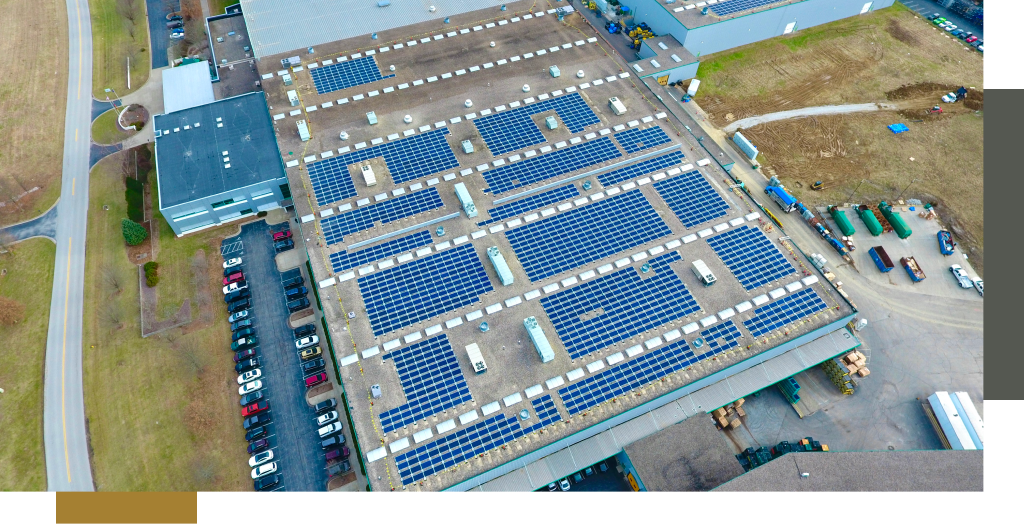 Solar panels on-top of a commercial building.
